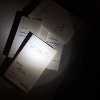 Gedichtbände von Nikolai Vogel im Taschenlampenlicht
